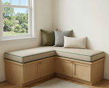 Beige L-shaped cushion on a light oak corner storage bench