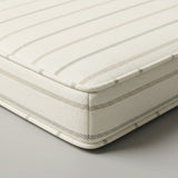 Cream outdoor cushion with thin taupe stripes and piping