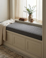 Charcoal point weave cushion on a white window seat with drawers