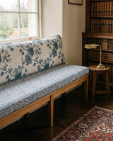 Blue floral back cushion and speckled seat cushion on an oak bench, made to measure by Foamera
