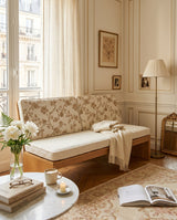 Beige floral back cushions and cream seat cushion on an oak bench